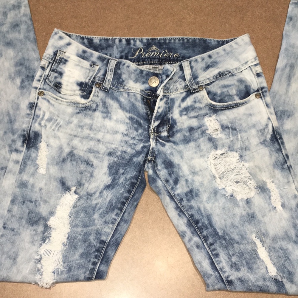 Acid wash distressed jeans